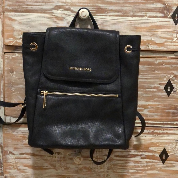 Michael Kors Handbags - BRAND NEW NEVER BEEN USED MK backpack.